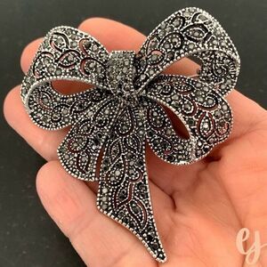 Bro-Brooch - Marcasite Style Bow Lapel Pin in Silver Tone Openwork